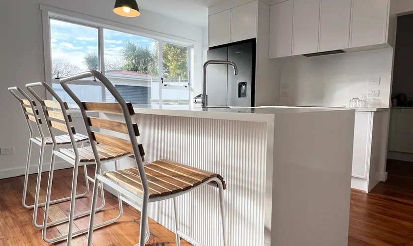 Fluted island and stools