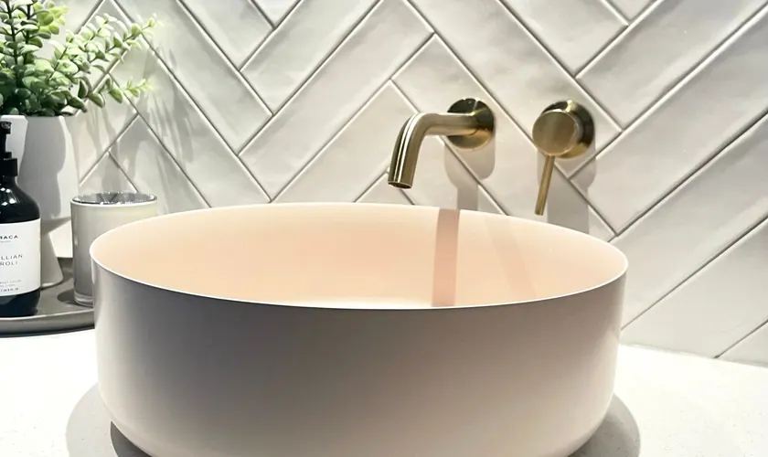 Basin and gold tap