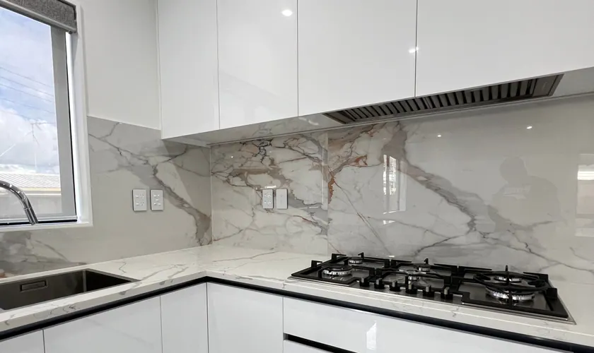 Marble splashback and hob